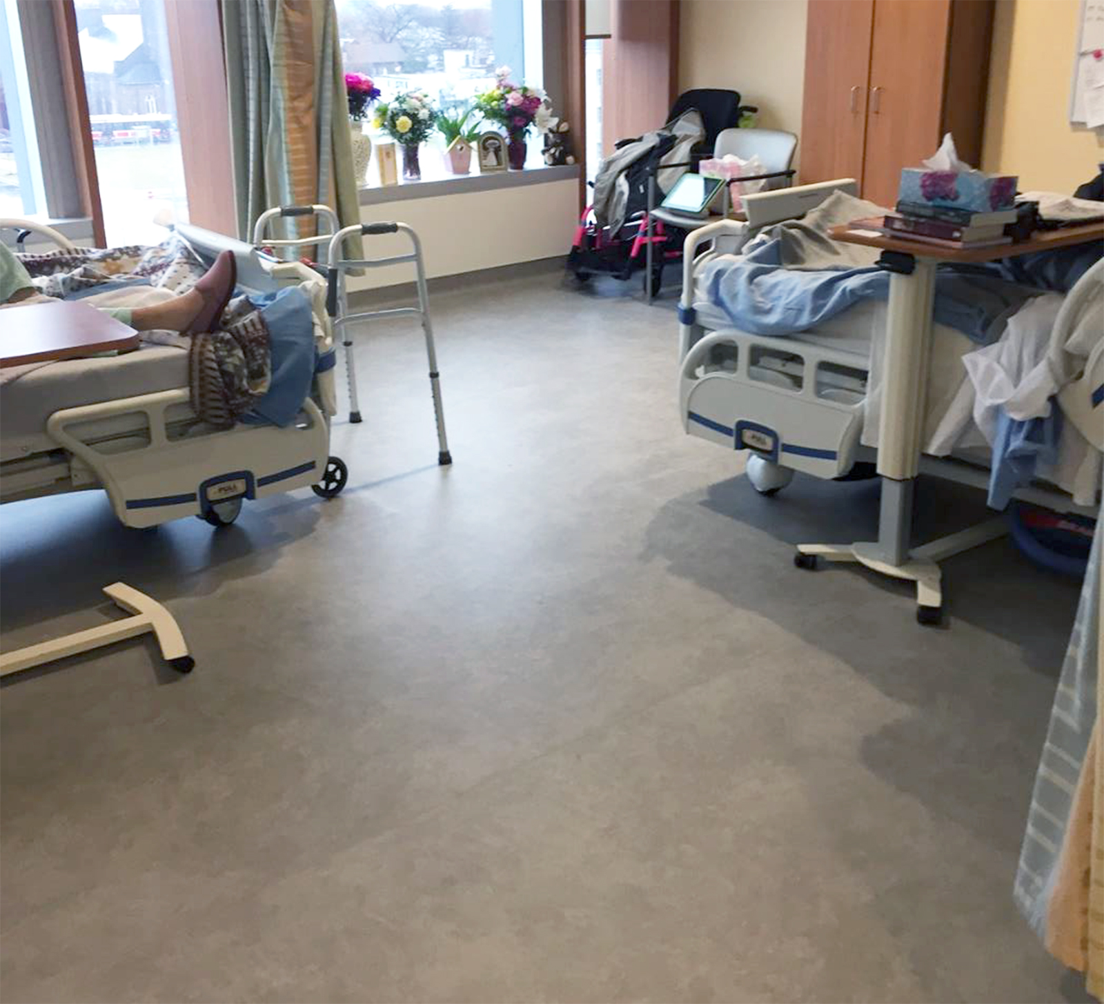 Medical Facility Hospital beds sitting on top of SmartCells flooring in senior living center