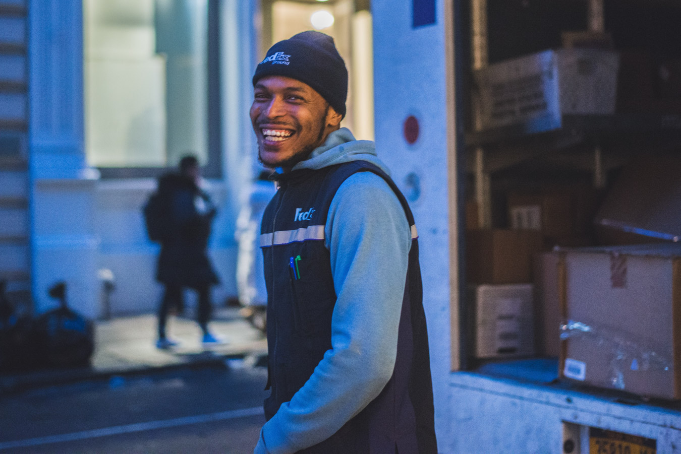 Delivery driver smiling while working
