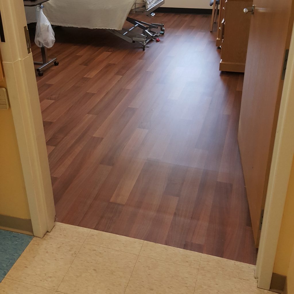 Medical bed on vinyl floor with Smartcells flooring underneath