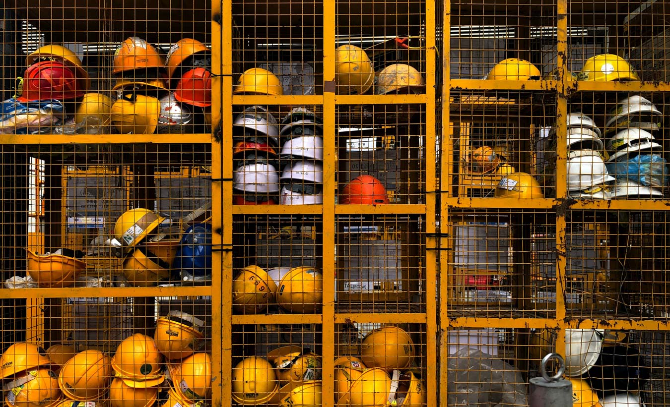 Safety Gear Construction hats inside of storage locker