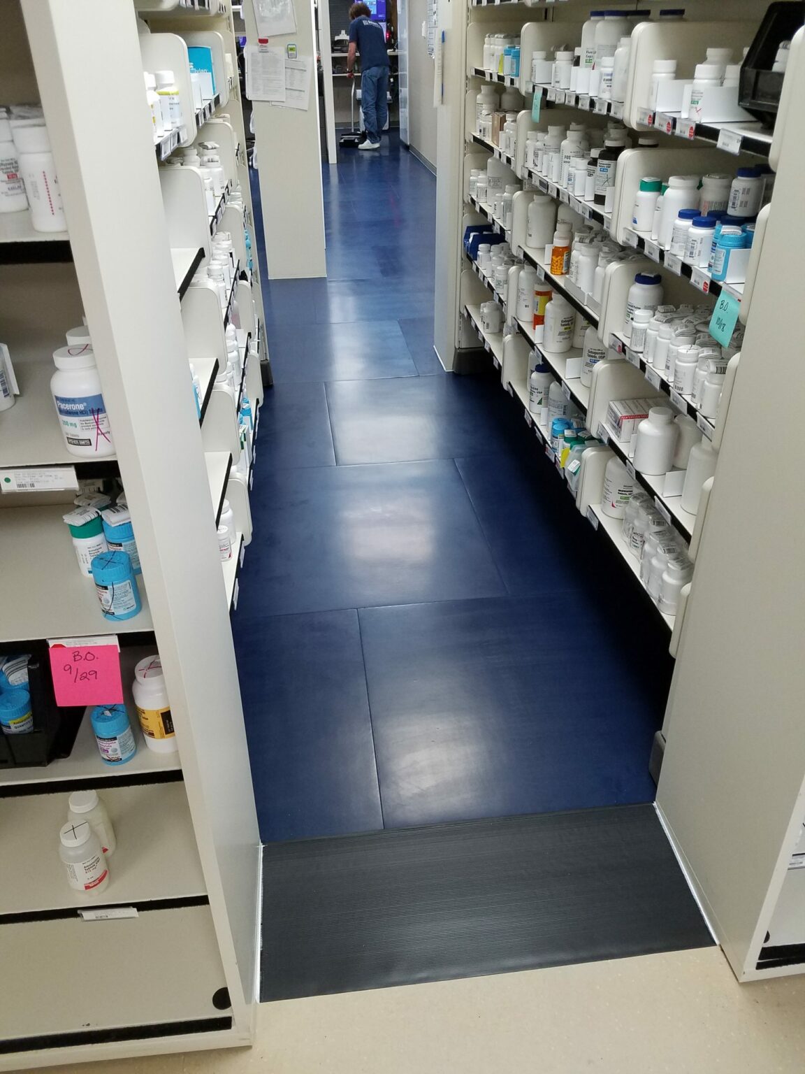 Older worker sitting in manufacturing environment