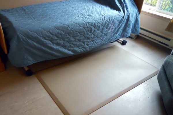 Helping Maintain Independence Older worker sitting in manufacturing environment