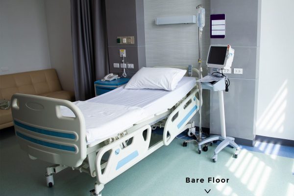 Older worker sitting in manufacturing environment