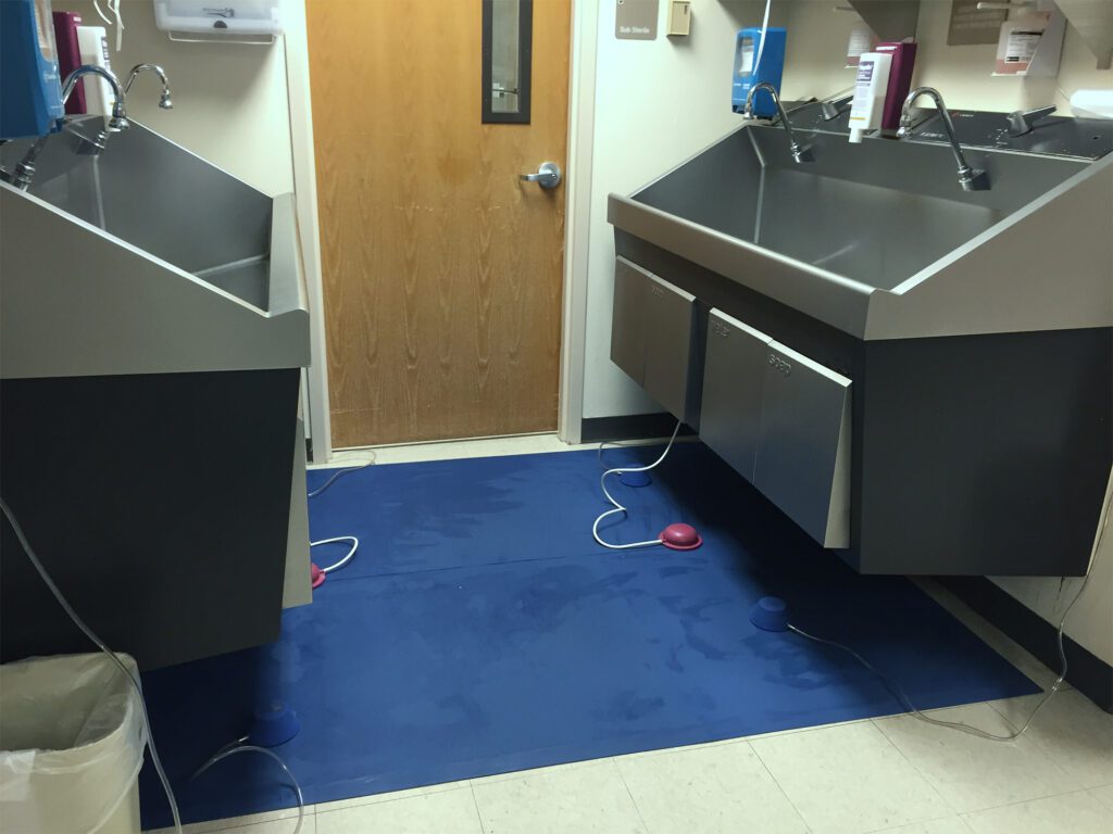 Older worker sitting in manufacturing environment