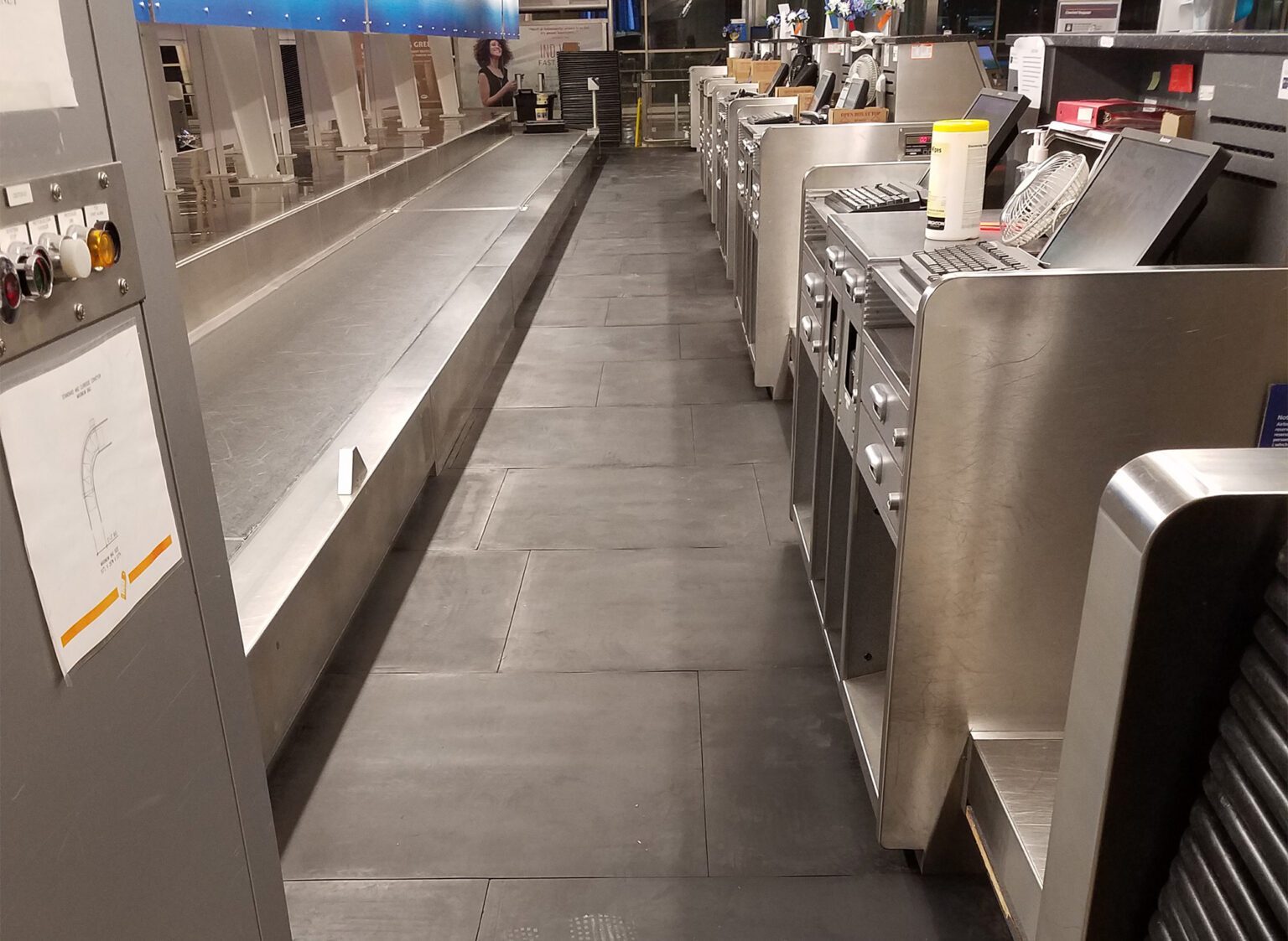 Older worker sitting in manufacturing environment