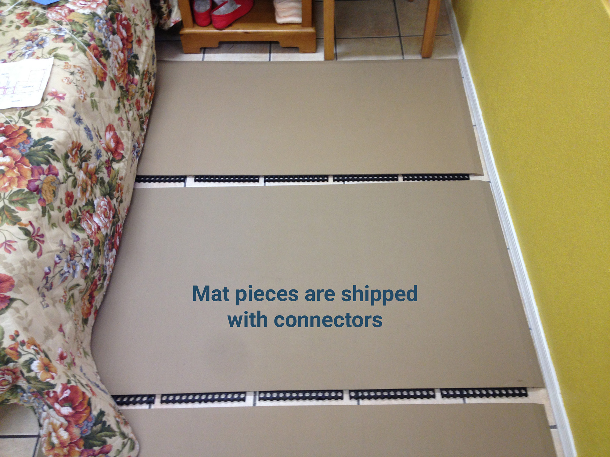 SmartCells Custom Modular Flooring Older worker sitting in manufacturing environment